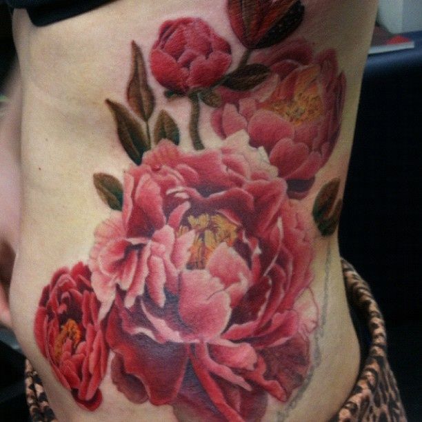 Realistic Peony Flowers Tattoo On Side Rib