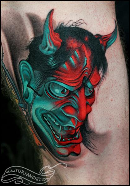 Red And Green Ink Hannya Tattoo On Bicep