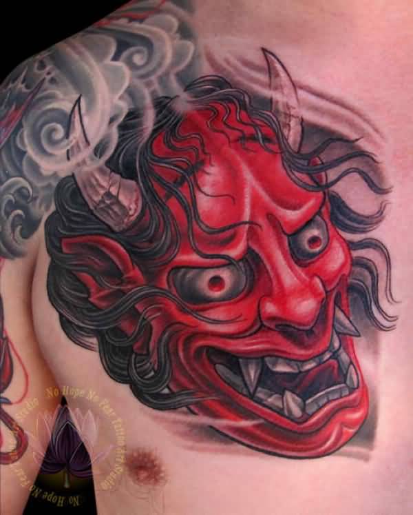 Red Ink Hannya Tattoo On Man Chest