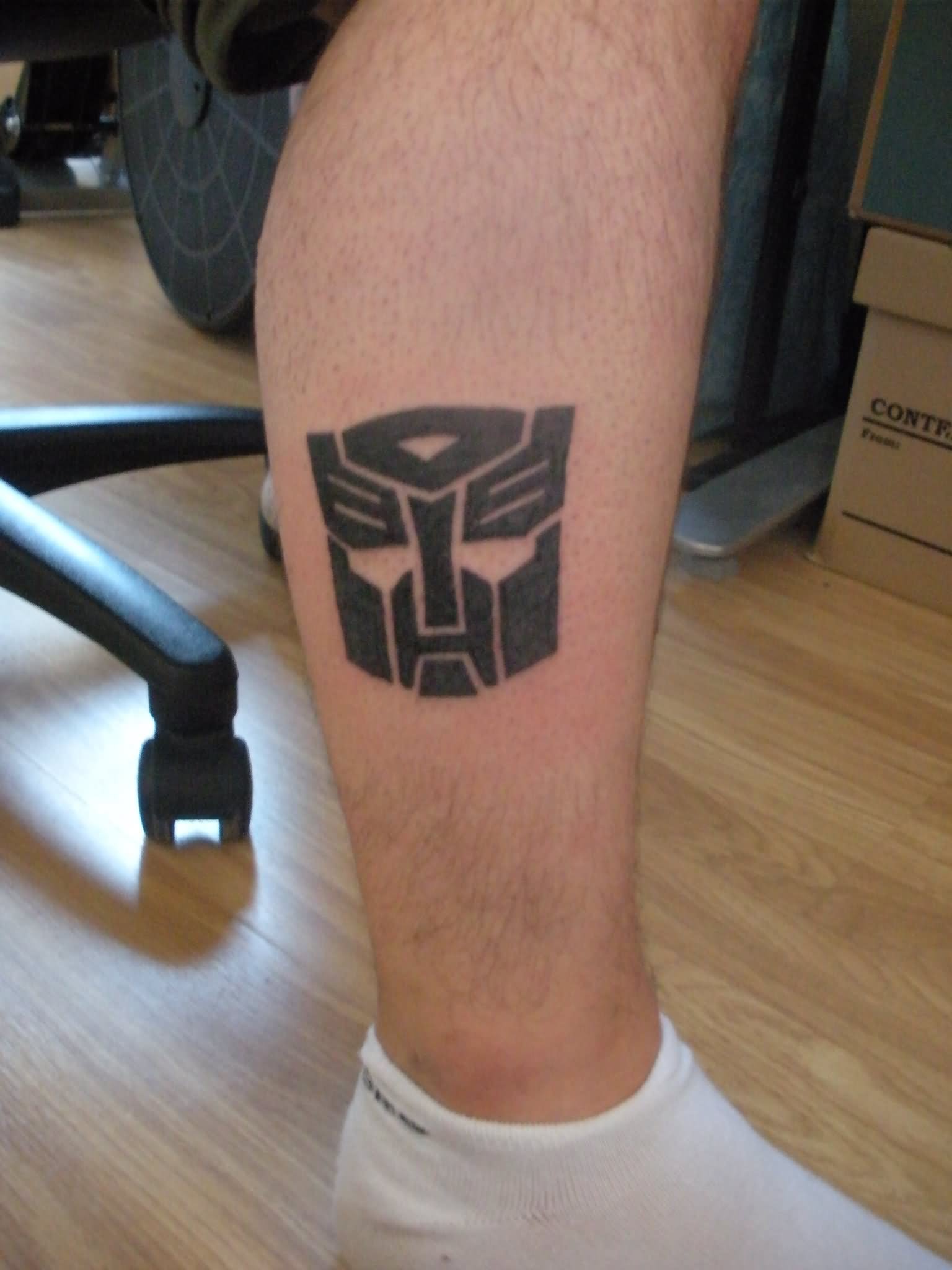 Simple Black Transformer Logo Tattoo On Right Leg Calf By Vinyard83