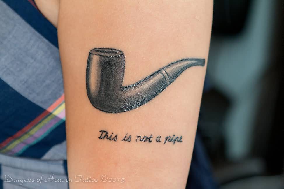 This Is Not A Pipe - Classic Black Ink Pipe Tattoo Design For Half Sleeve