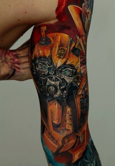 Transformer Bumblebee Tattoo On Bicep By Dmitriy Samohin