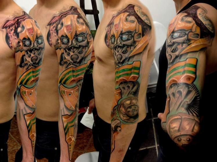 Transformer Bumblebee Tattoo On Man Left Half Sleeve
