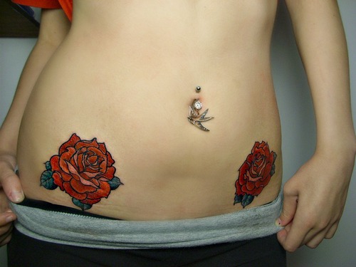 Two Red Rose Tattoo On Girl Hip