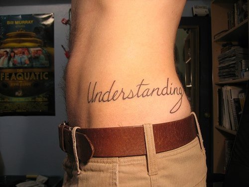 Understanding Word Tattoo On Left Hip