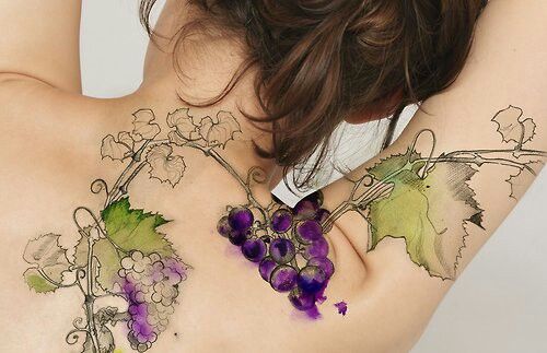 Watercolor Grapes Tattoo On Girl Upper Back By Gabriel Moreno