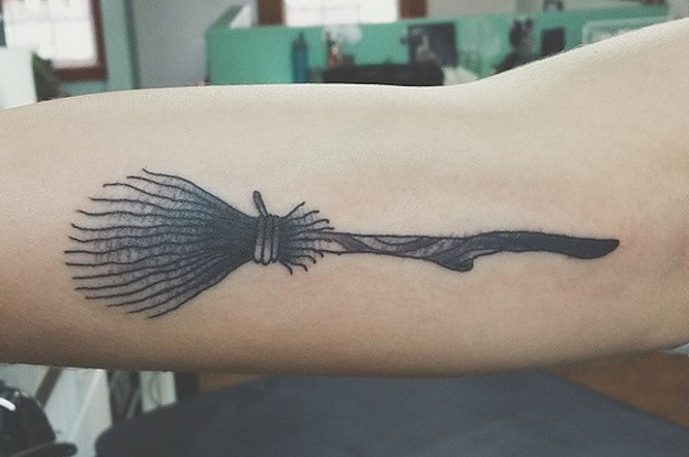 Witch Wand Tattoo On Bicep