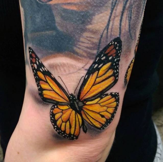 Yellow Butterfly Tattoo On Arm