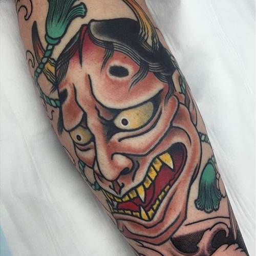 Yellow Teeth Hannya Tattoo On Arm