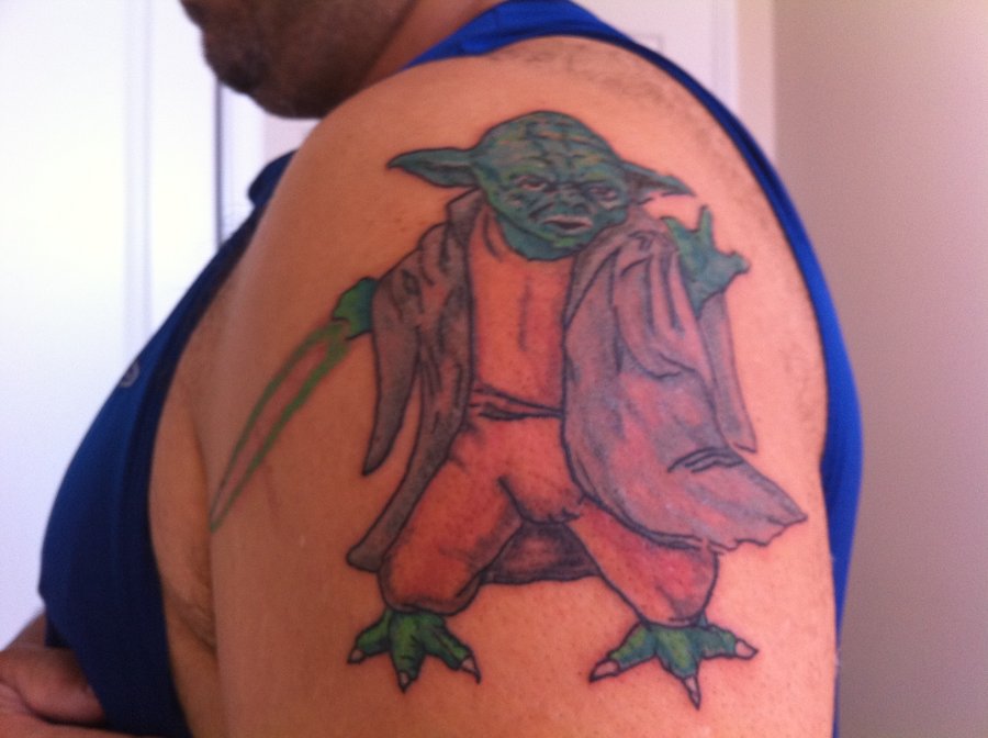 Amazing Star Wars Yoda Tattoo On Man Left Shoulder By Travis Molitor