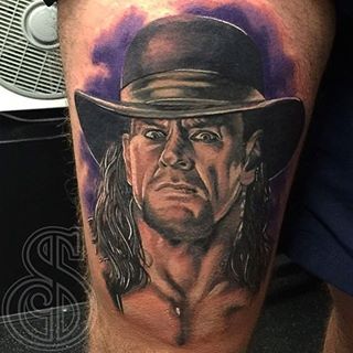 Amazing WWE Undertaker Head Tattoo On Thigh By Aaron Norton