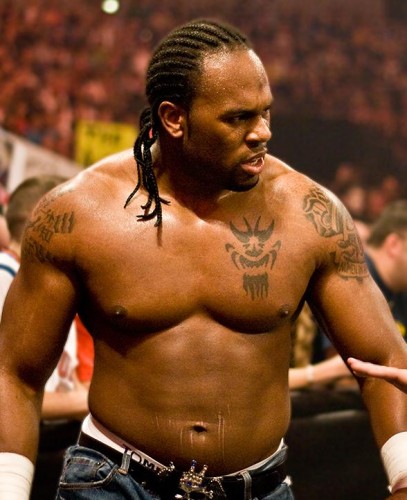 Attractive Black Tattoo On WWE Shad Left Chest