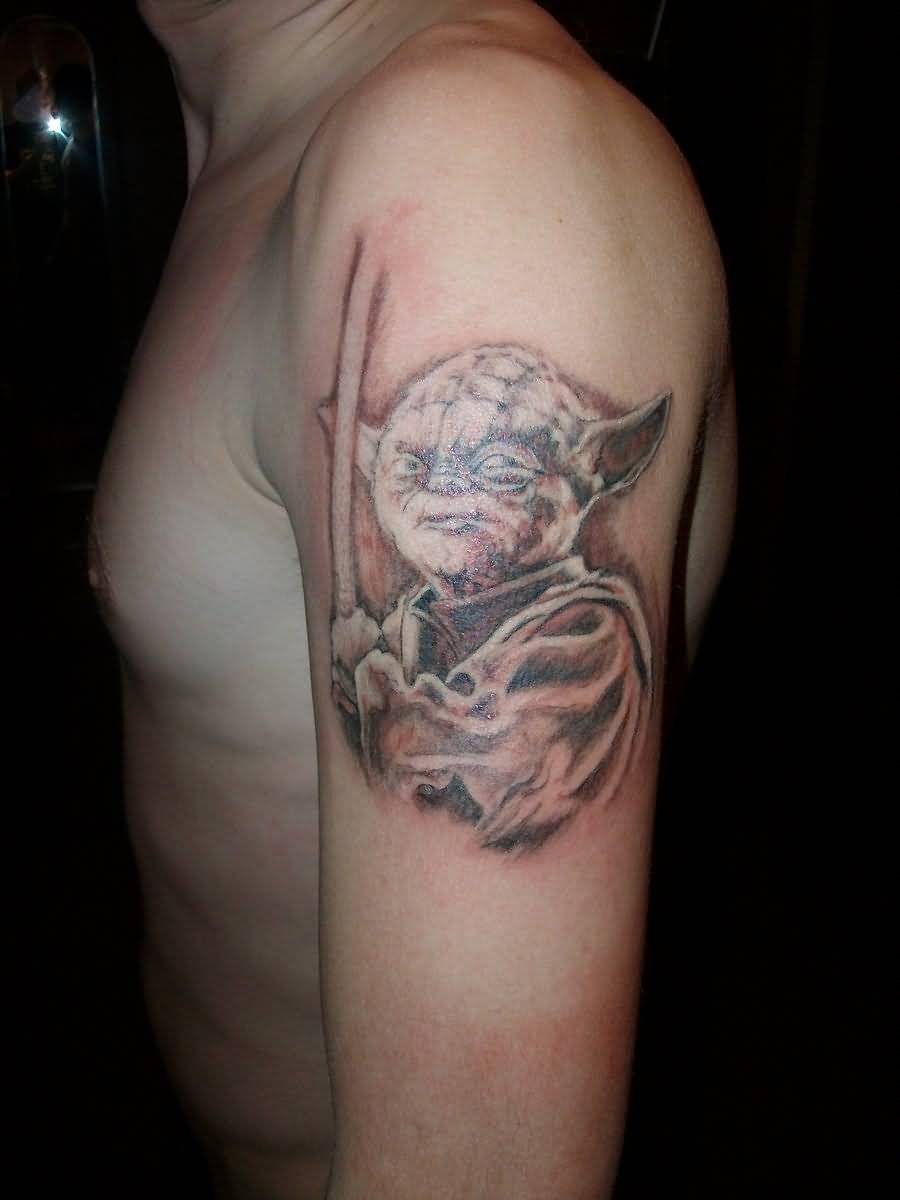 Black Ink Star Wars Yoda Tattoo On Man Left Half Sleeve