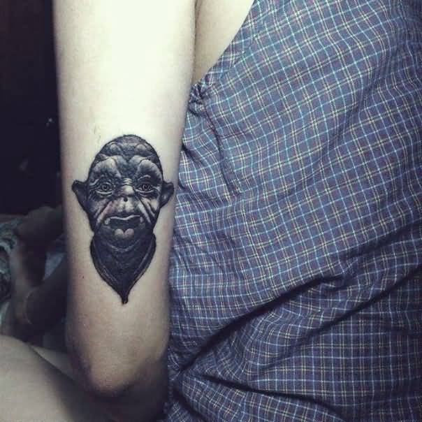 Black Ink Yoda Head Tattoo On Left Half Sleeve