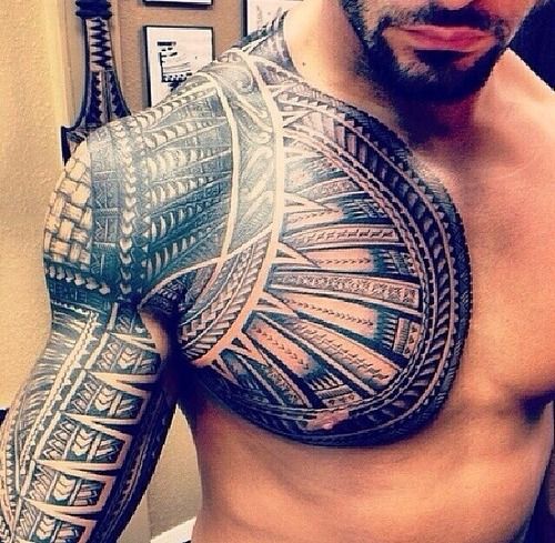 Black Polynesian Tattoo On WWE Roman Reigns Right Shoulder And Chest