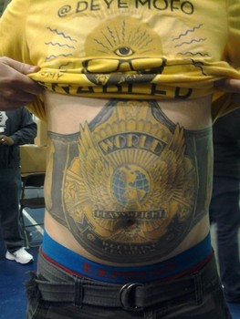 Classic WWE Championship Belt Tattoo On Man Stomach