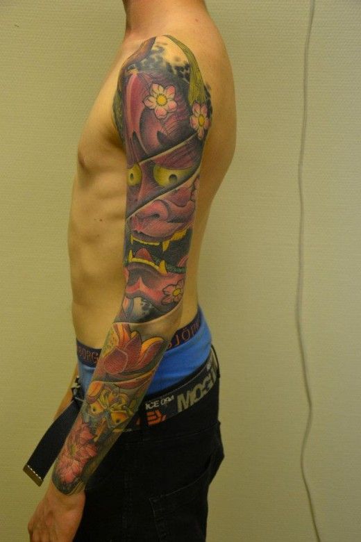 Colored Hannya Tattoo On Man Left Sleeve