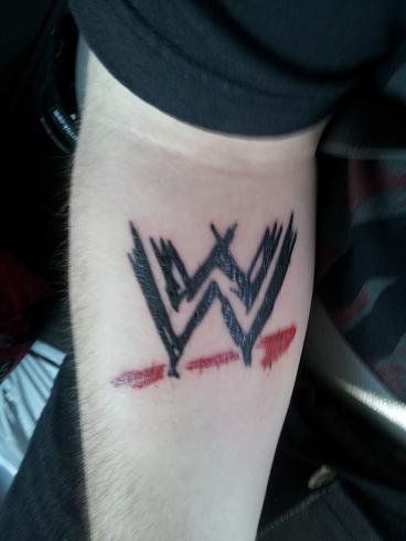 Cool WWE Logo Tattoo On Forearm