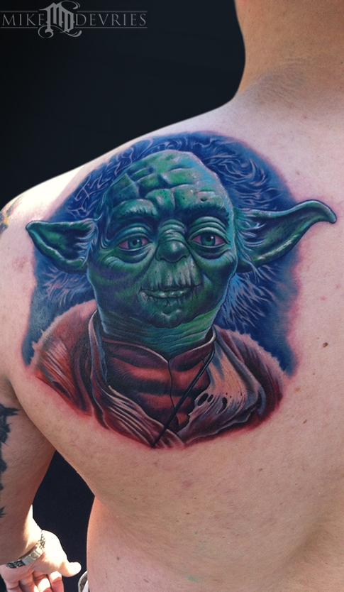 Cool Yoda Tattoo On Left Back Shoulder