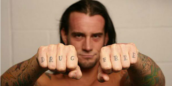 Drug Free Lettering Tattoo On WWE Cm Punk Both Hand Fingers