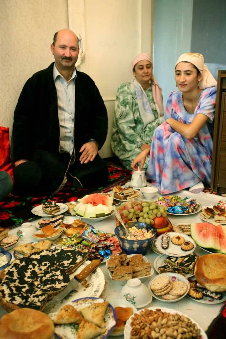 Family Enjoying Eid Al-Adha Traditional Food Picture