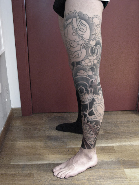 Grey Ink Japanese Hannya Leg Tattoo