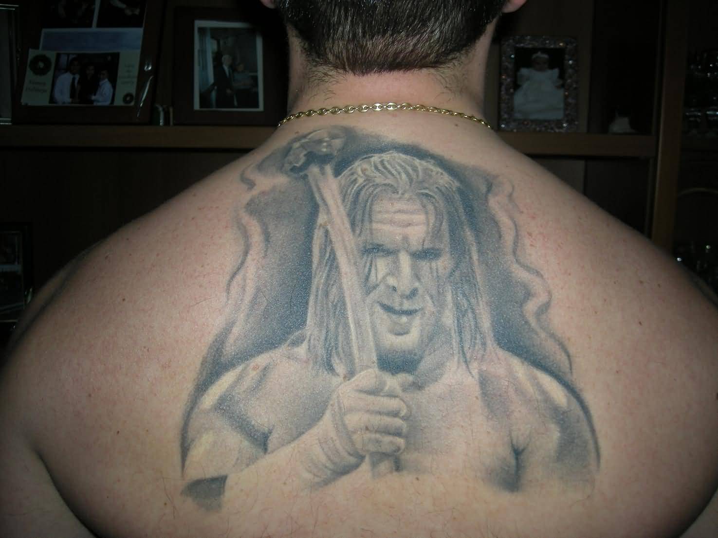 Grey Ink WWE Triple H Tattoo On Man Upper Back