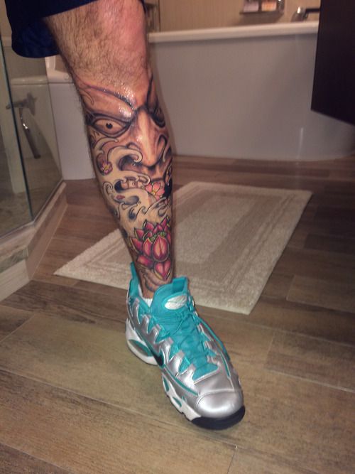 Man Left Leg Hannya Mask Tattoo