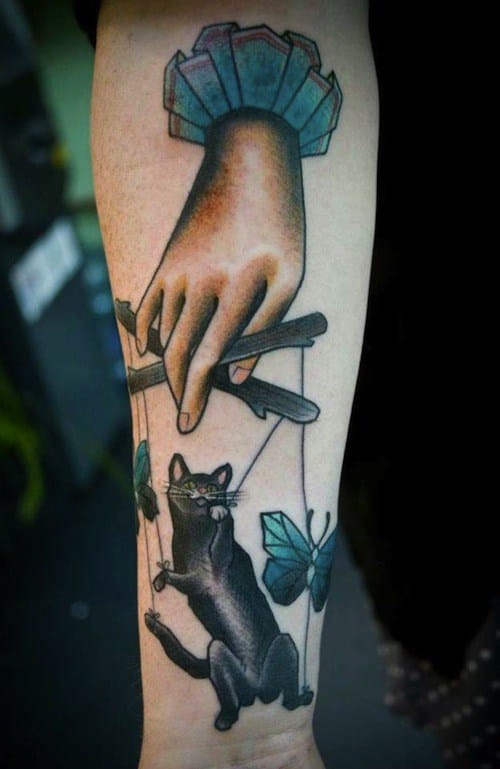 Marionette Cat With Butterflies Tattoo On Forearm By Silje Roe Hagland