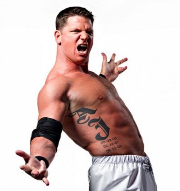 Memorial AJ Word Tattoo On WWE AJ Styles Right Side Rib