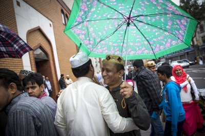 Muslim Brothers Greeting Each Other On Eid al-Adha
