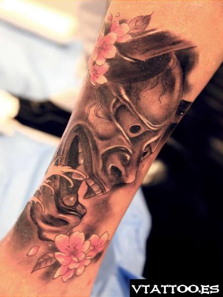 Pink Flowers And Hannya Tattoo On Arm