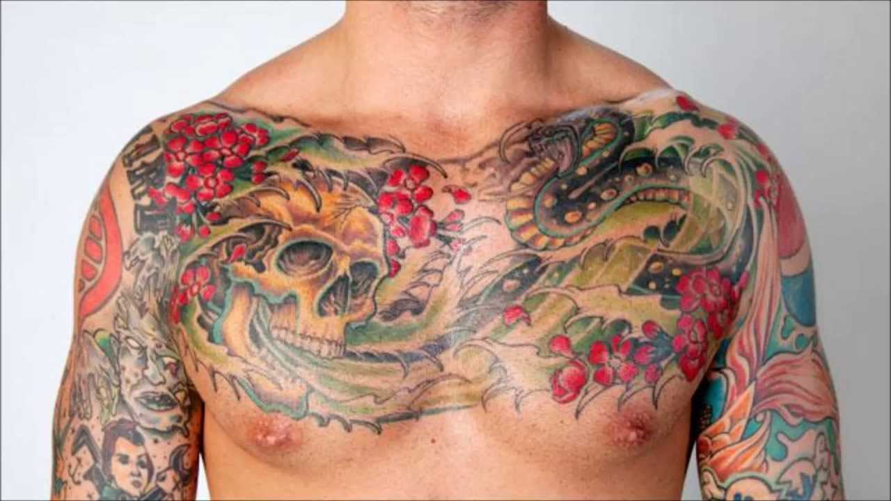 Skull And Snake With Cherry Blossom Tattoo On WWE Cm Punk Chest