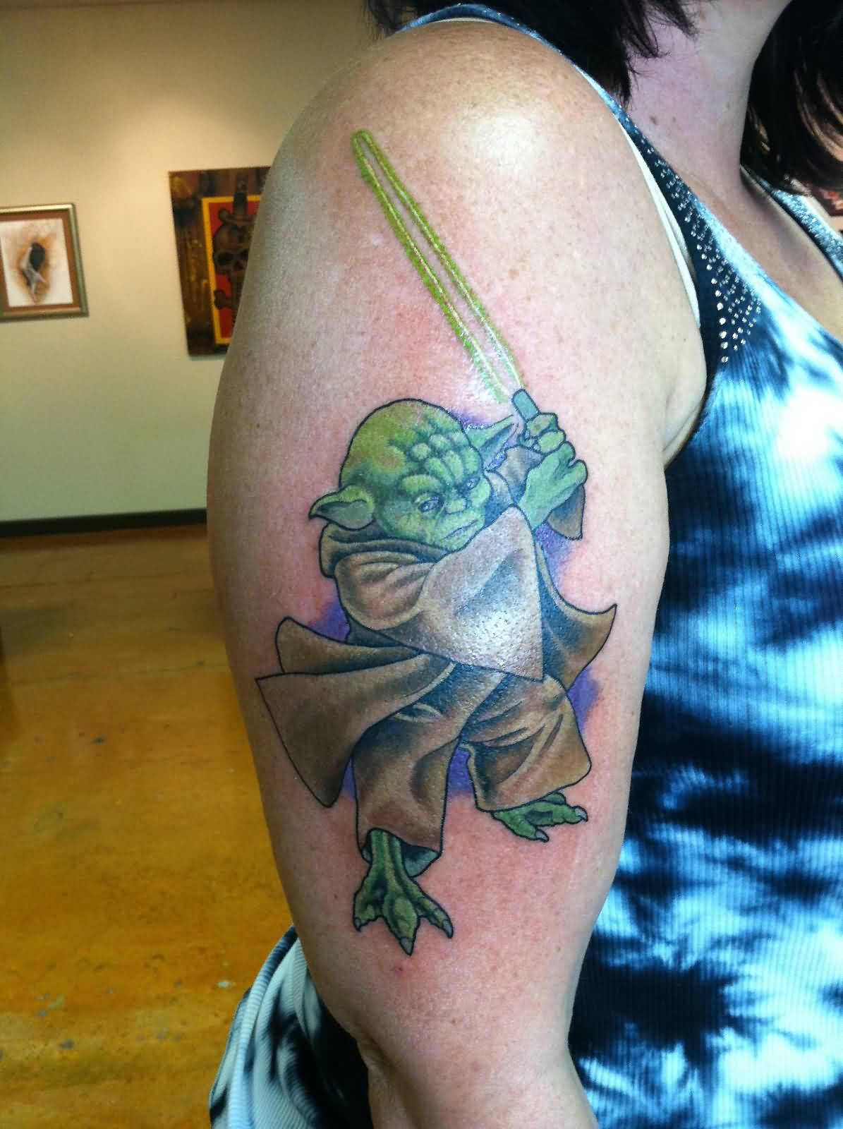Star Wars Yoda With Lightsaber Tattoo On Girl Right Half Sleeve