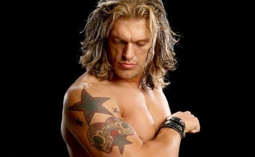 Sugar Skull With Star Tattoo On WWE Edge Right Shoulder