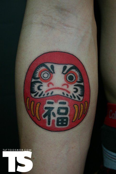 Traditional Daruma Doll Tattoo On Right Forearm