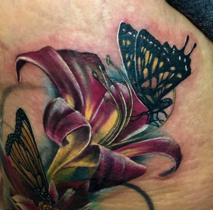 Amazing Color Butterfly On Flower Tattoo