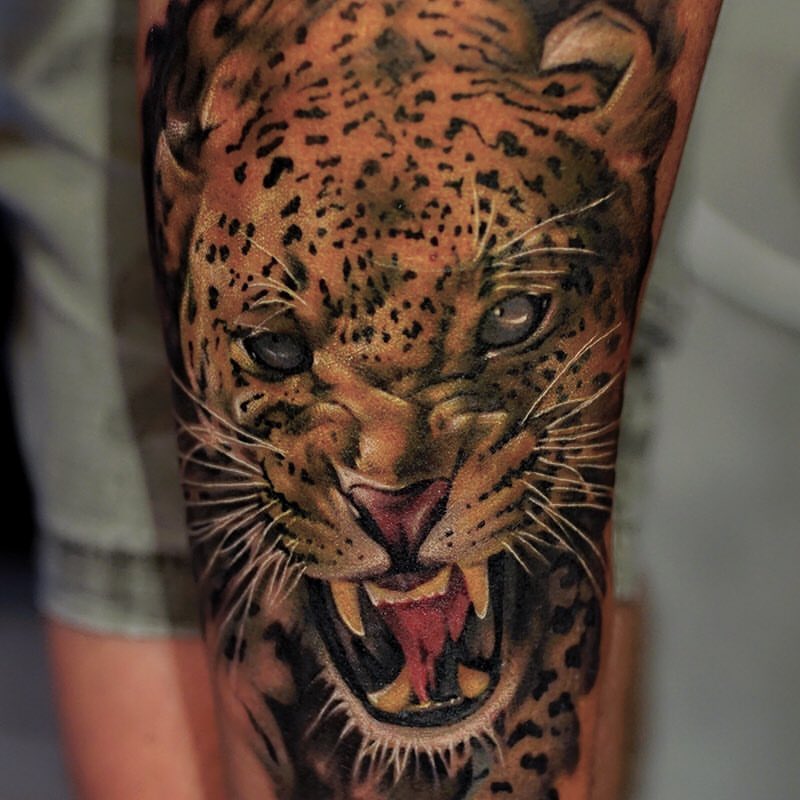 Angry Jaguar Tattoo On Left Thigh by Khan Tattoo