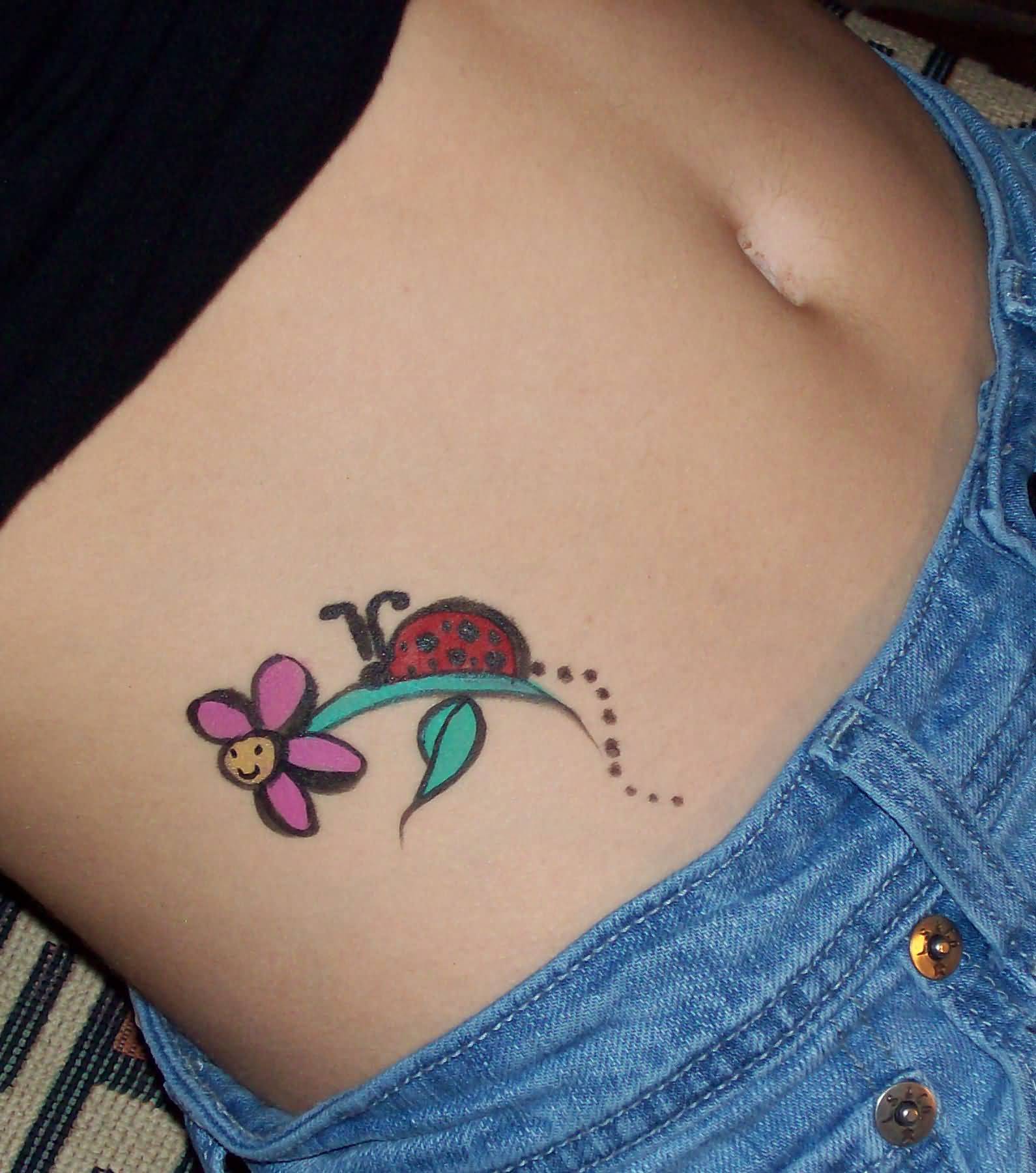 Animated Flower And Ladybug Tattoo On Right Hip