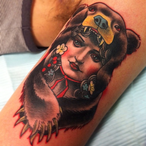Bear Girl Tattoo On Bicep by Caleb Pritchet