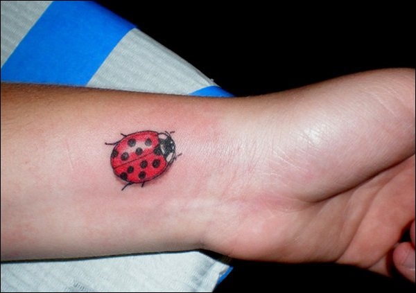 Beautiful Ladybug Tattoo On Left Wrist