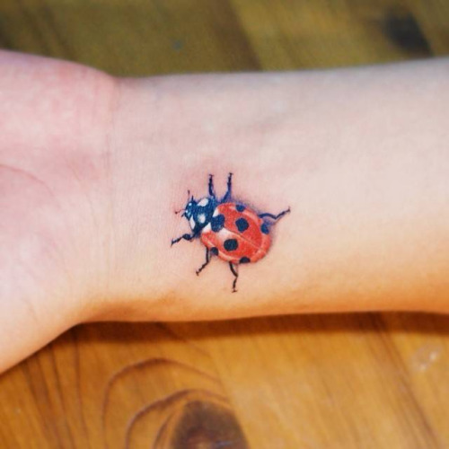 Beautiful Left Wrist Ladybug Tattoo