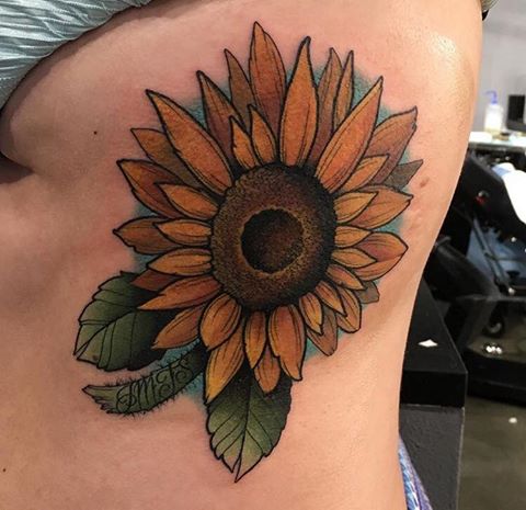 Beautiful Sun Flower tattoo On Side Rib by Chad Lambert