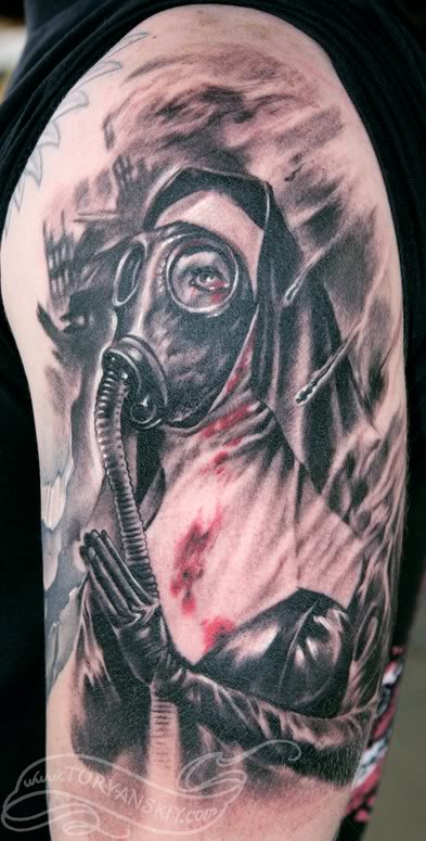 Black And Grey Gas Mask Tattoo On Left Half Sleeve