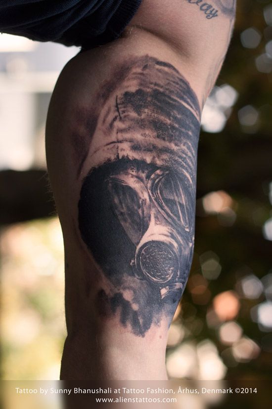 Black And Grey Gas Mask Tattoo On Leg
