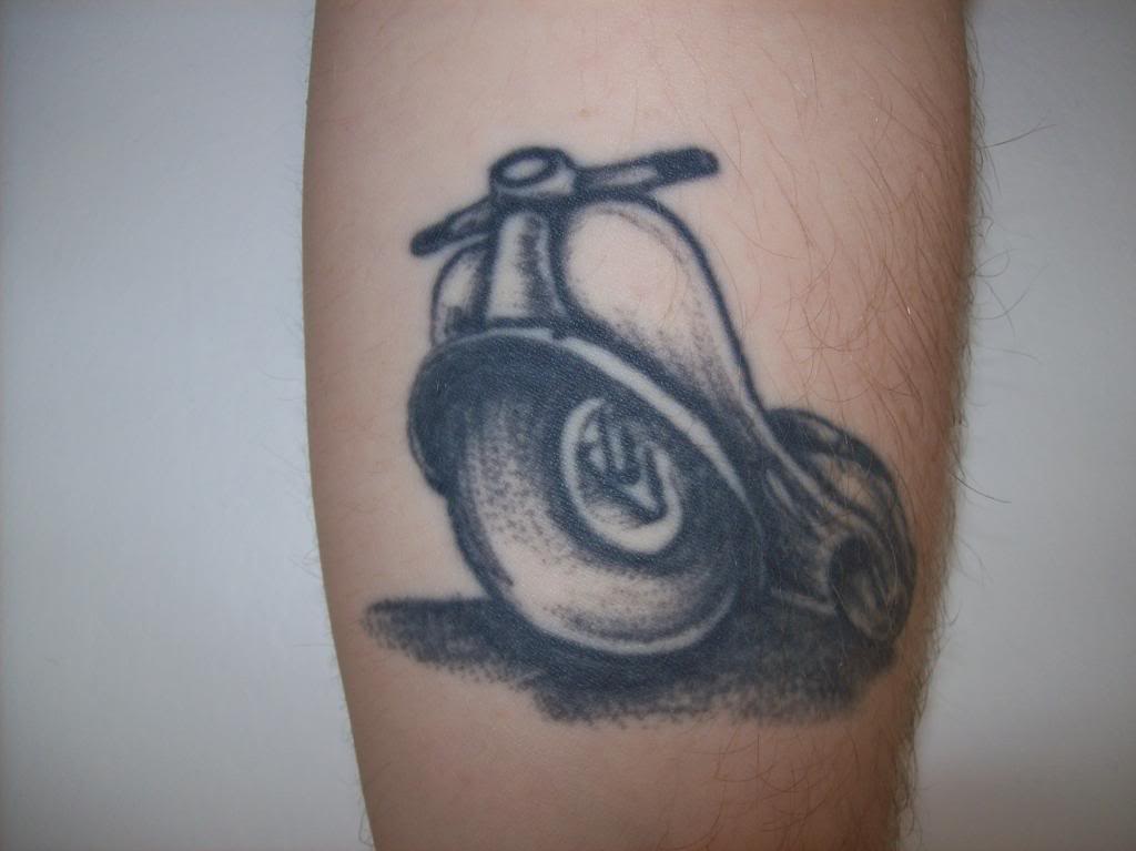 Black And Grey Ink Vespa Tattoo On Leg Calf