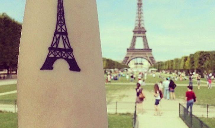 Black Eiffel Tower Tattoo On Arm