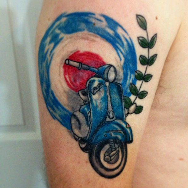 Blue Scooter Tattoo On Right Bicep