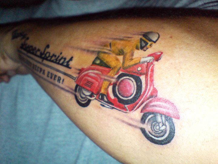 Color Ink Vespa Tattoo On Left Arm