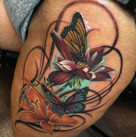 Colored Butterflies And Flowers Tattoos On Left Thigh